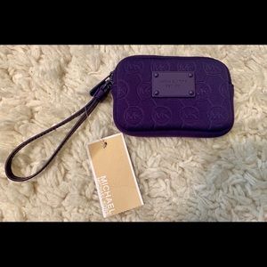 Purple Michael Kors wristlet/electronic holder